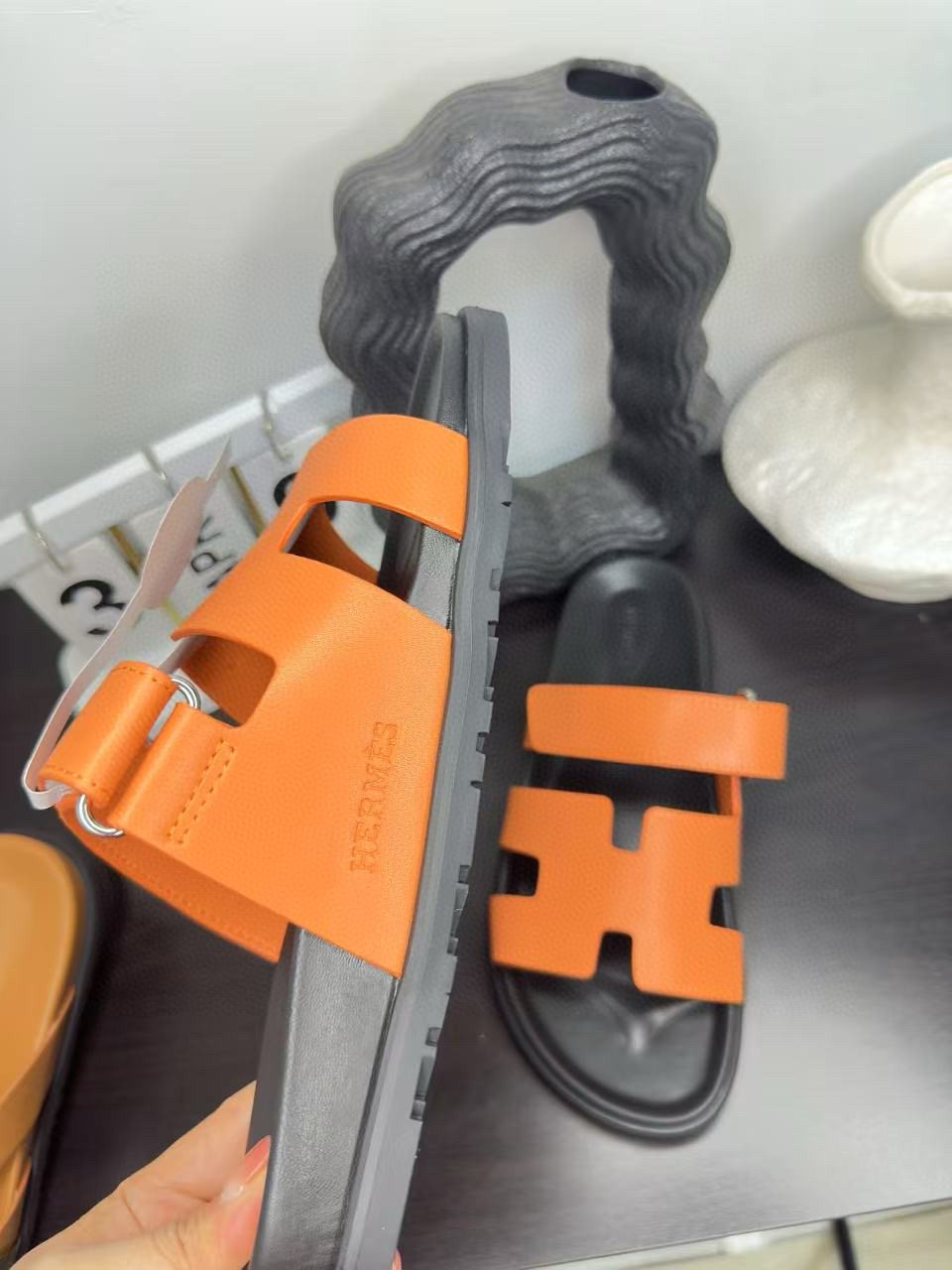 Hermès Orange Interwoven Slide Sandals - Orange and Black